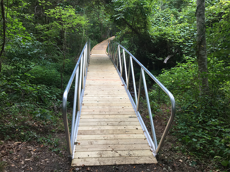 aluminum gangways go between a set of dolphins