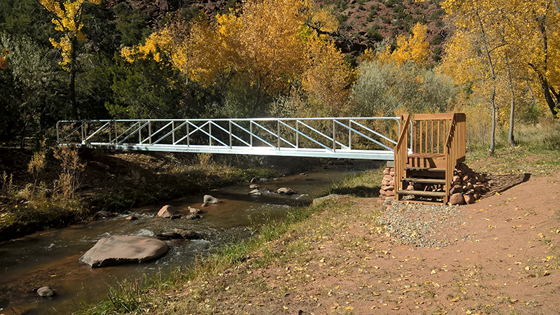 Aluminum gangway from shore to dolphin.