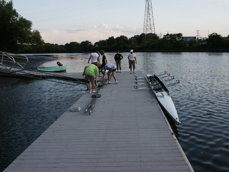 Rowing skull docked at float.