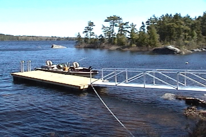 30 foot gangway attached to float by piano hinge